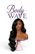 Zeta’s Vault body wave human hair lace front wig in deep black on a mannequin bust with voluminous, soft-touch waves.